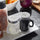 KITOME Salt and Pepper Shakers Set – Ceramic Spice Dispensers with Stainless Steel Lids & Handles, Black & White, 2-Piece Kitchen Dining Set