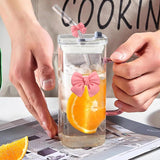 FUNKYFINDS Pink Cute Bow Square Glass Cup with Lid and Straw, Pink Glass Tumbler with Handle Bow Knot Transparent Drinking Glasses for Juice, Iced Coffee, Milk, and Tea Girl Birthday Gifts (Set of 1)