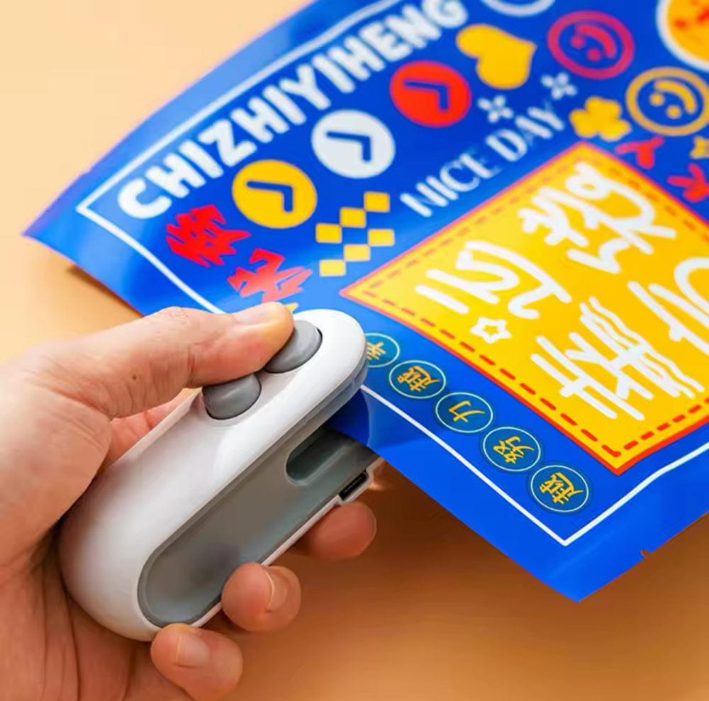 Rechargeable Mini Pocket Bag Sealer – USB Rechargeable Portable Heat Sealing Machine for Snack & Food Storage Bags (With Box Packing)